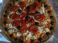 SUPRA: Диетическая пицца с вялеными помидорами и маслинами